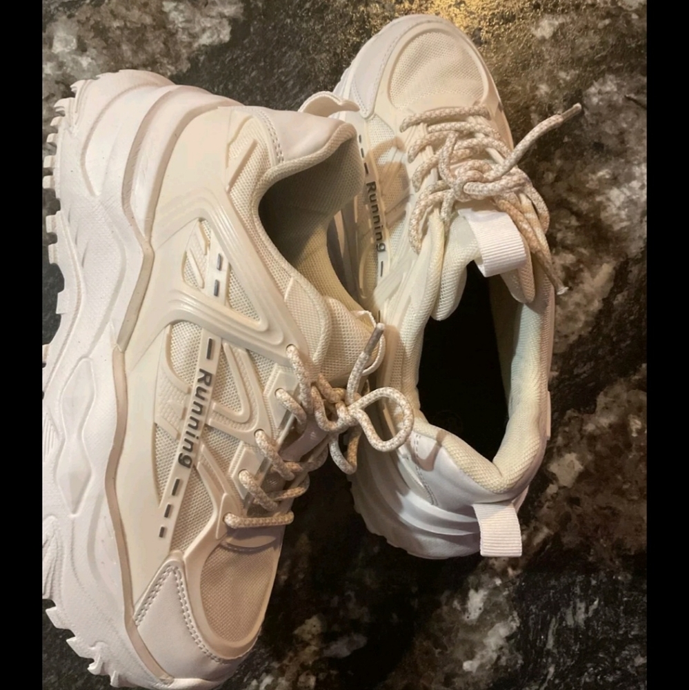 Sneakers,designed for running, beige color, and shoes size 38.